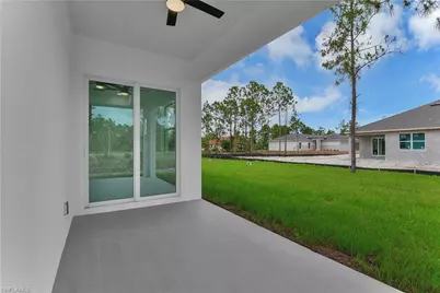654 Trinity St E, Lehigh Acres, FL 33974 - Photo 27
