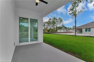 654 Trinity St E, Lehigh Acres, FL 33974 - Photo 27