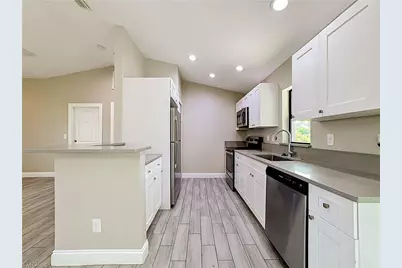 2612 15th St SW, Lehigh Acres, FL 33976 - Photo 13
