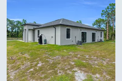 1054 Ainsworth St E, Lehigh Acres, FL 33974 - Photo 7