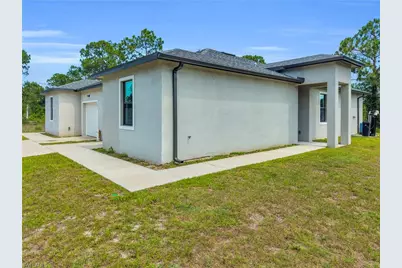 1054 Ainsworth St E, Lehigh Acres, FL 33974 - Photo 5