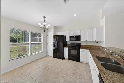 510 Beach Ave S, Lehigh Acres, FL 33974 - Photo 9