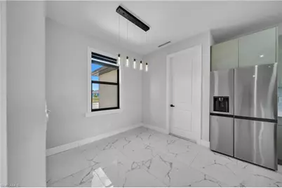 1128 Nelson Rd N, Cape Coral, FL 33993 - Photo 9