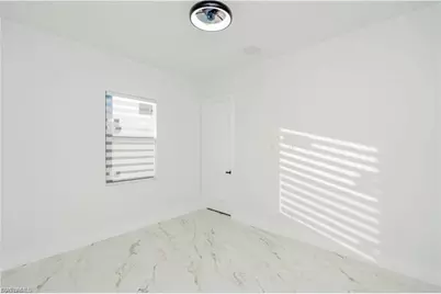 1142 Eclipse St E, Lehigh Acres, FL 33974 - Photo 25