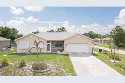 105 Eric Ave N, Lehigh Acres, FL 33971 - Photo 1