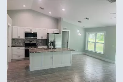 4169 NW 38th Pl, Cape Coral, FL 33993 - Photo 3