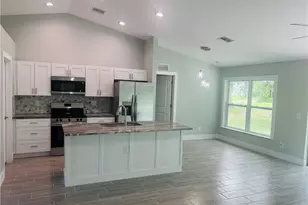 4169 NW 38th Pl, Cape Coral, FL 33993 - Photo 3