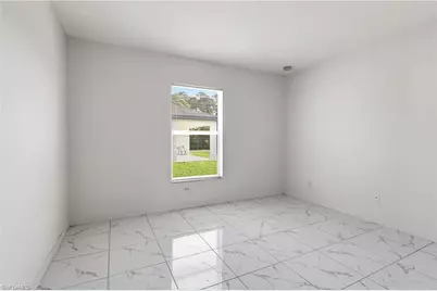 1403 Curtis Ave S, Lehigh Acres, FL 33976 - Photo 25