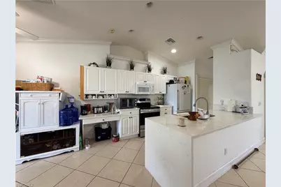 1621 SW 14th Ter, Cape Coral, FL 33991 - Photo 5