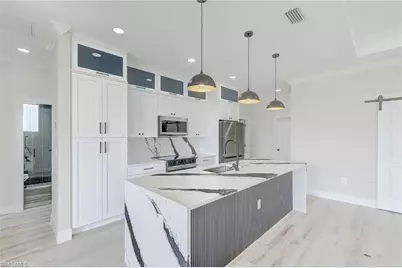 1019 Cedartree Ave, Lehigh Acres, FL 33971 - Photo 17