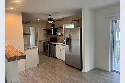 16 Greenwood Ave, Lehigh Acres, FL 33936 - Photo 5
