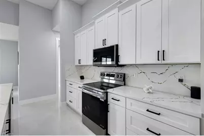 313 NE 5th Ter, Cape Coral, FL 33909 - Photo 11