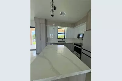 124 SE 2nd Ave, Cape Coral, FL 33990 - Photo 13