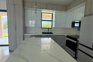 124 SE 2nd Ave, Cape Coral, FL 33990 - Photo 13