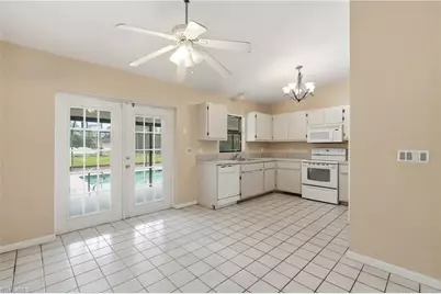 906 Wells Ave, Lehigh Acres, FL 33972 - Photo 13