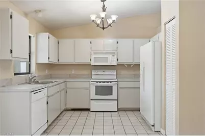 906 Wells Ave, Lehigh Acres, FL 33972 - Photo 17
