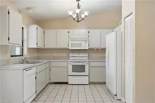 906 Wells Ave, Lehigh Acres, FL 33972 - Photo 17