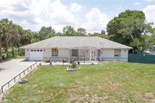 517 Plumosa Ave, Lehigh Acres, FL 33972 - Photo 1