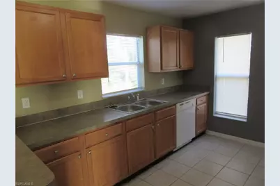 922 Eisenhower Blvd, Lehigh Acres, FL 33974 - Photo 13