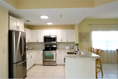 4450 Botanical Place Cir #301, Naples, FL 34112 - Photo 3
