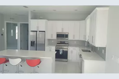 653 Foxchase Dr, Lehigh Acres, FL 33974 - Photo 25
