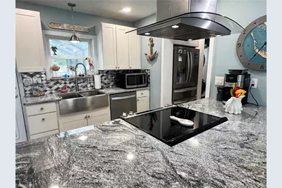 3772 Tropical Point Dr, Saint James City, FL 33956 - Photo 9