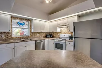 122 NW 9th Ter, Cape Coral, FL 33993 - Photo 7