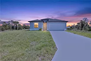 911 Panda Dr, Lehigh Acres, FL 33974 - Photo 1