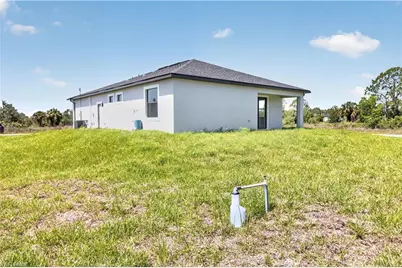 911 Panda Dr, Lehigh Acres, FL 33974 - Photo 49