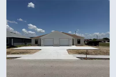 703 SE 8th St, Cape Coral, FL 33990 - Photo 1