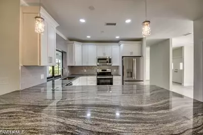 711 SE 33rd Ter, Cape Coral, FL 33904 - Photo 5