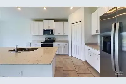 12312 Amber Waves Rd, Lehigh Acres, FL 33974 - Photo 9