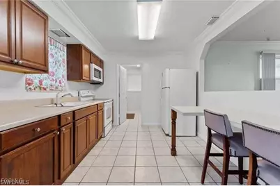 312 Grovewood Ave S, Lehigh Acres, FL 33936 - Photo 23