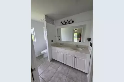 409 Hull Ave S, Lehigh Acres, FL 33974 - Photo 11