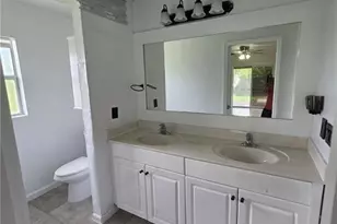 409 Hull Ave S, Lehigh Acres, FL 33974 - Photo 11