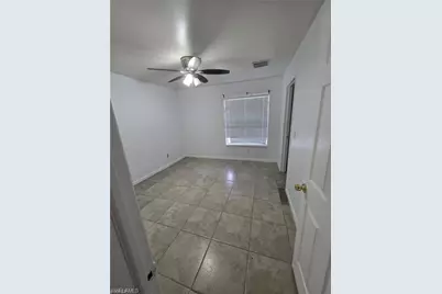 409 Hull Ave S, Lehigh Acres, FL 33974 - Photo 13