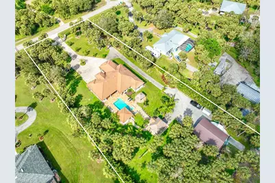 214 9th St NW, Naples, FL 34120 - Photo 1