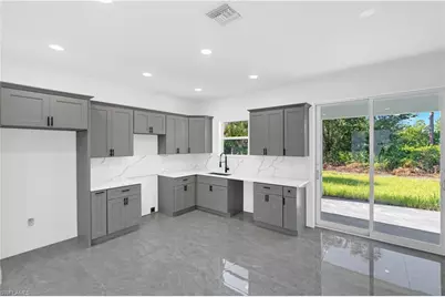 864 Chantilly St E, Lehigh Acres, FL 33974 - Photo 9