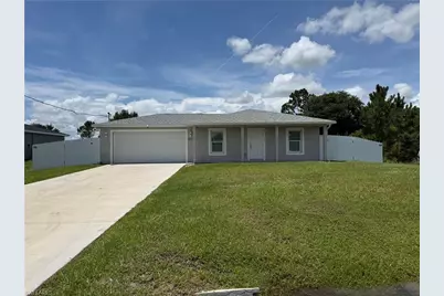 557 Oakshire Ln, Lehigh Acres, FL 33972 - Photo 1
