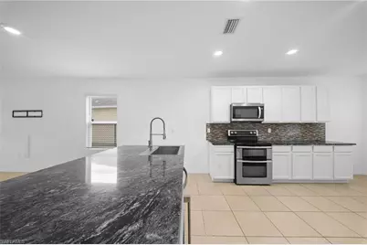 10464 Canal Brook Ln, Lehigh Acres, FL 33936 - Photo 11