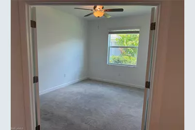 9093 Leatherwood Loop, Lehigh Acres, FL 33936 - Photo 7