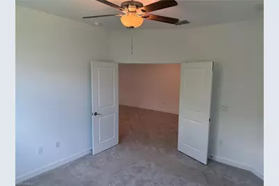 9093 Leatherwood Loop, Lehigh Acres, FL 33936 - Photo 9