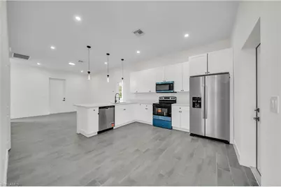 707 Randall Ave E, Lehigh Acres, FL 33974 - Photo 11