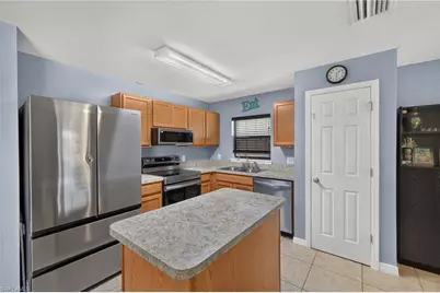 225 Shadow Lakes Dr, Lehigh Acres, FL 33974 - Photo 9