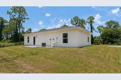 1120 Ravenswood St E, Lehigh Acres, FL 33974 - Photo 5