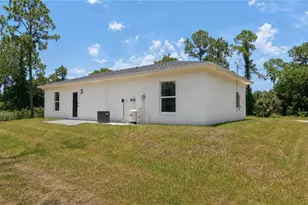 1120 Ravenswood St E, Lehigh Acres, FL 33974 - Photo 5