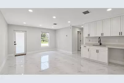 1120 Ravenswood St E, Lehigh Acres, FL 33974 - Photo 17