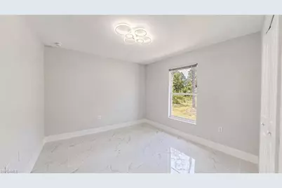1120 Ravenswood St E, Lehigh Acres, FL 33974 - Photo 15