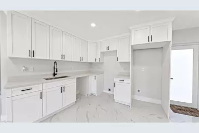 1120 Ravenswood St E, Lehigh Acres, FL 33974 - Photo 9