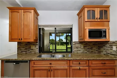 11477 Longshore Way W, Naples, FL 34119 - Photo 9